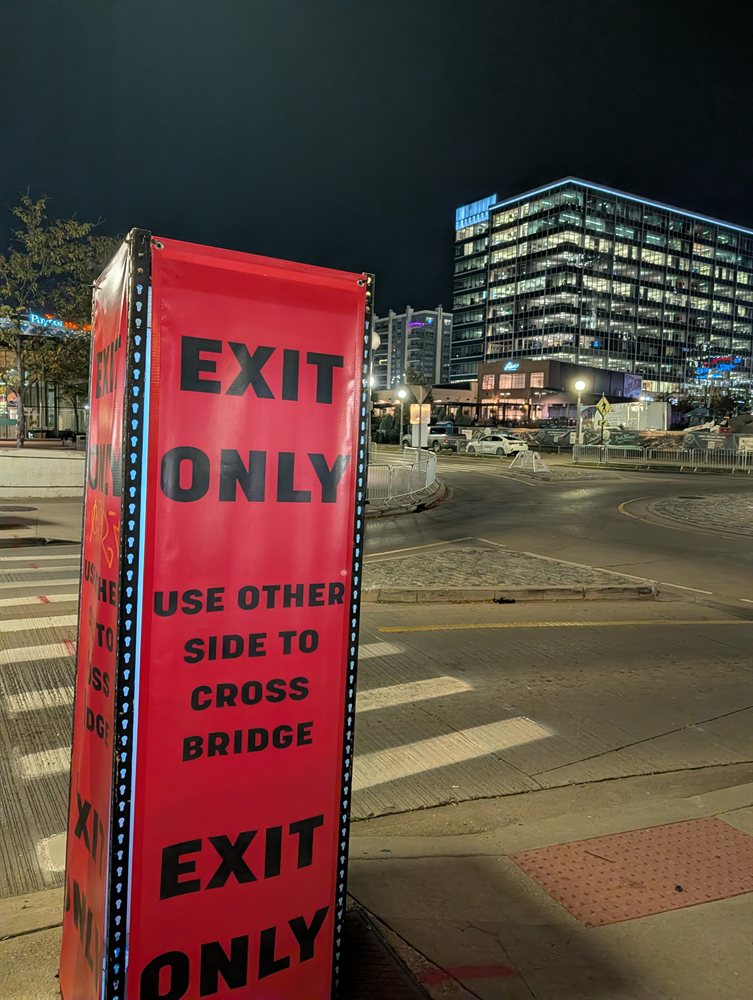 Red exit-only banner at the bridge approach near RiverCenter